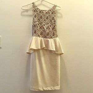 White peplum dress with black and white lace.